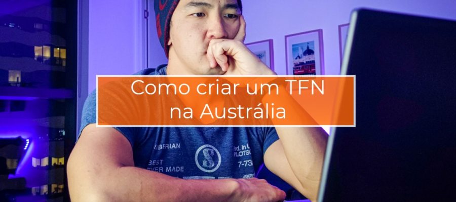 Homem atrás do notebook pensativo, e título de como abrir TFN na australia